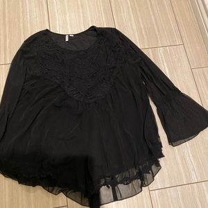 Flowing sheer bell sleeve top